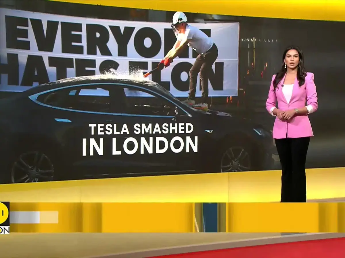 Smashed Tesla Tesla smashed in London protest against Elon Musk and Trump ties