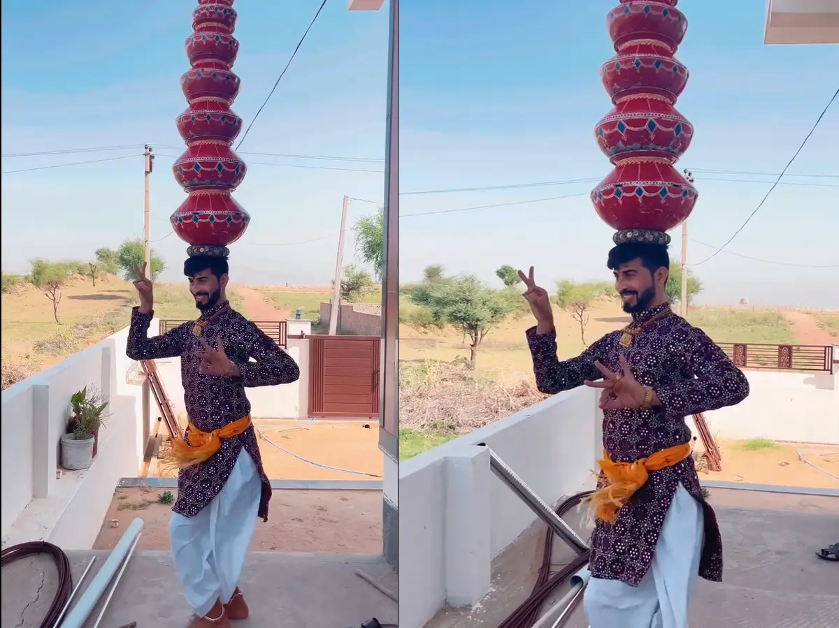 सिर पर 9 मटके रखकर रामू मारवाड़ी ने लगाए दमदार ठुमके, टैलेंट को सलाम कर रहे लोग सिर पर 9 मटके रखकर रामू मारवाड़ी ने लगाए दमदार ठुमके, टैलेंट को सलाम कर रहे लोग