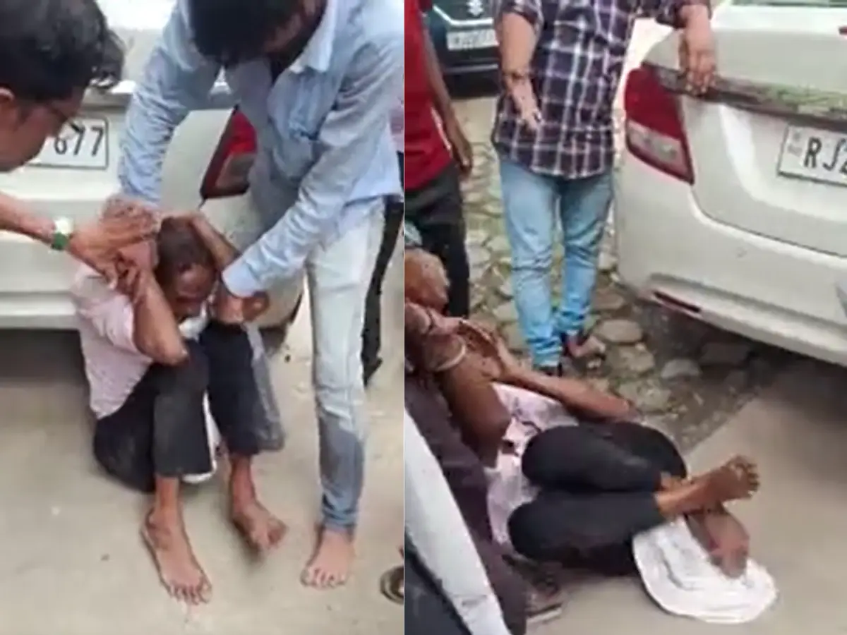 चोरी करते पकड़ा गया शख्स, लोगों ने बरसाए लात-घूसे, देखें वीडियो