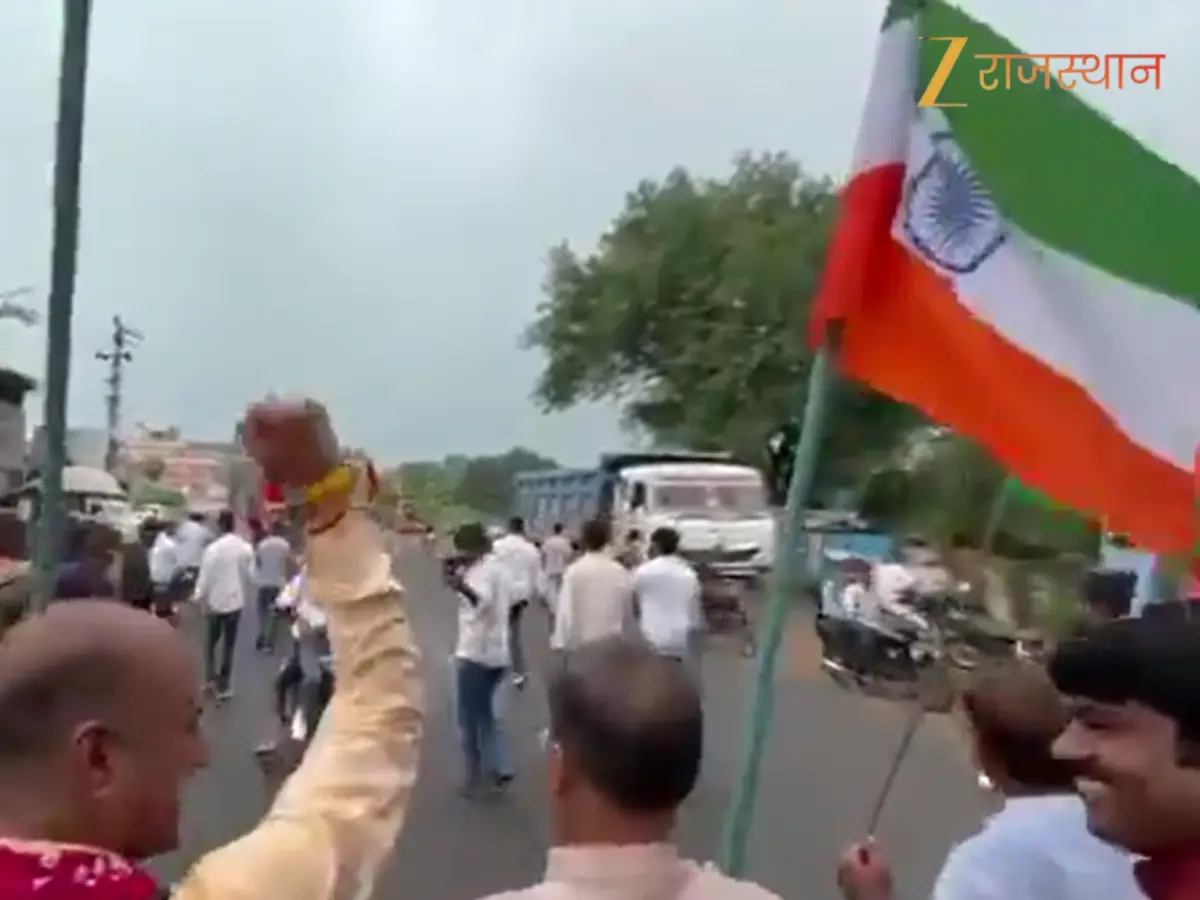 उल्टा तिरंगा लेकर चले मंत्री हेमंत मीणा! सोशल मीडिया पर मचा बवाल