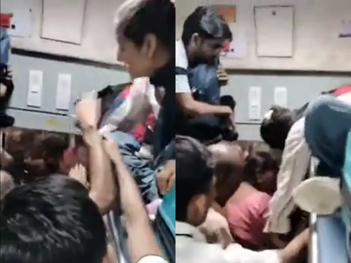 ट्रेन में महिलाओं ने युवक की जमकर की पिटाई, Video Viral